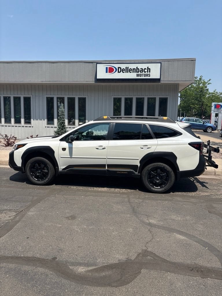 2024 Subaru Outback Wilderness in Crystal White Pea — front three-quarter view